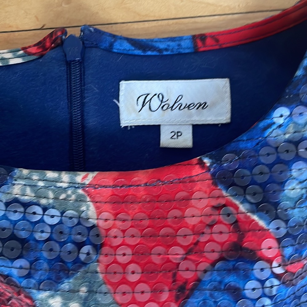 Anthropologie sequin peplum top
